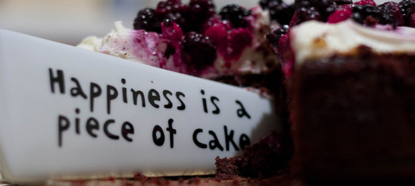 Mes met tekst happiness is a piece of cake.